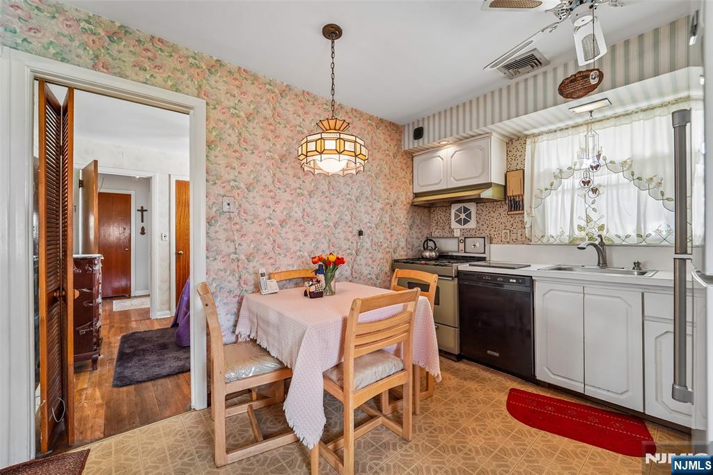 193 Homestead Road Paramus, NJ 07652 - Photo 13 of 33 a kitchen with a sink cabinets and window