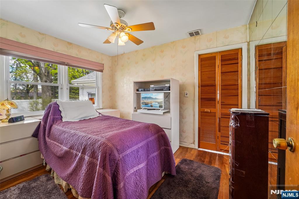193 Homestead Road Paramus, NJ 07652 - Photo 15 of 33 a bed room with a bed and a window