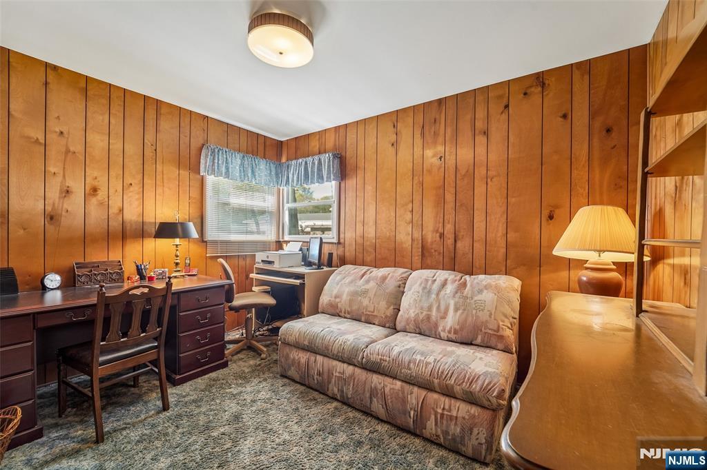 193 Homestead Road Paramus, NJ 07652 - Photo 20 of 33 a living room with furniture a large window and a potted plant