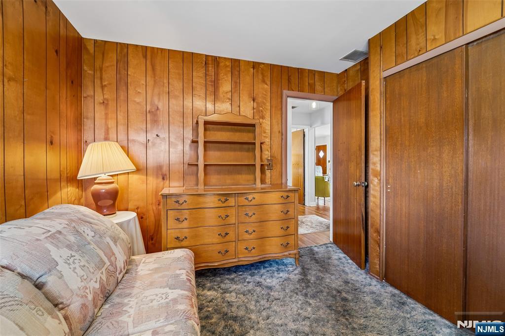 193 Homestead Road Paramus, NJ 07652 - Photo 21 of 33 a bedroom with a bed and a dresser