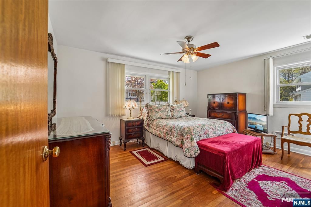 193 Homestead Road Paramus, NJ 07652 - Photo 22 of 33 a bedroom with a bed dresser and a window