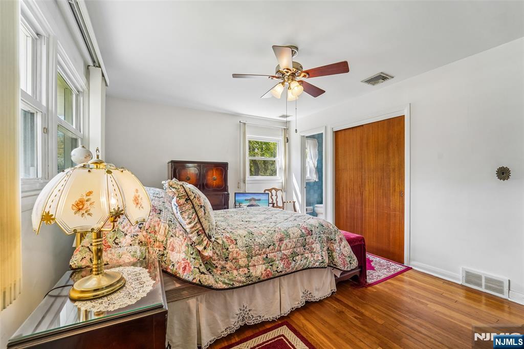 193 Homestead Road Paramus, NJ 07652 - Photo 24 of 33 a bedroom with bed and wooden floor