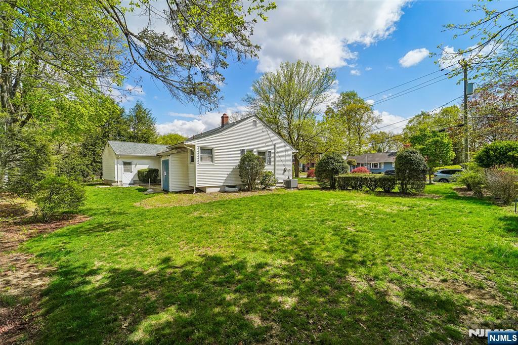 193 Homestead Road Paramus, NJ 07652 - Photo 31 of 33 a view of house with a yard