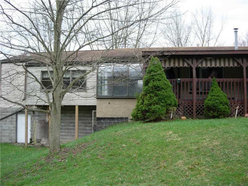 9962 Grubbs Road Wexford, PA 15090 - Photo 13 of 15 Exterior Back. Back of house showing two one of the two atriums and the covered back porch. Great place to see the turkeys and deer. check out the next photos of the turkeys