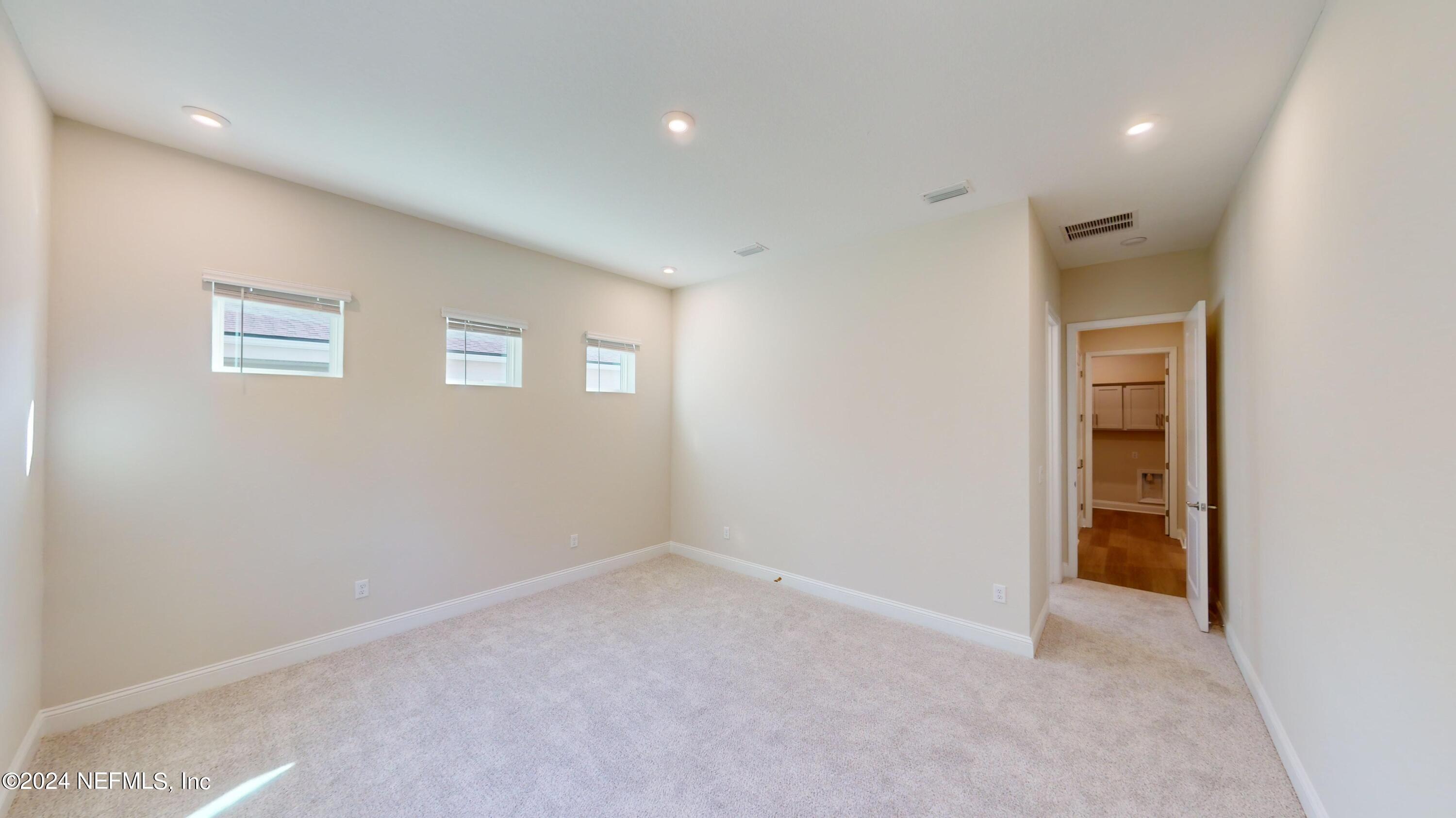 310 Ladyslipper Drive St. Johns, FL 32259 - Photo 25 of 82 310-Ladyslipper-Dr-Owners-suite