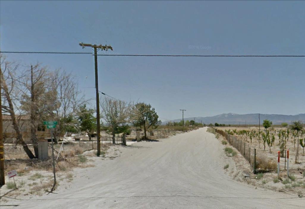 Cor Blanco Road Adelanto, CA 92301 - Photo 3 of 11 a view of a lake with a beach