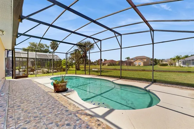 a view of a house with a swimming pool