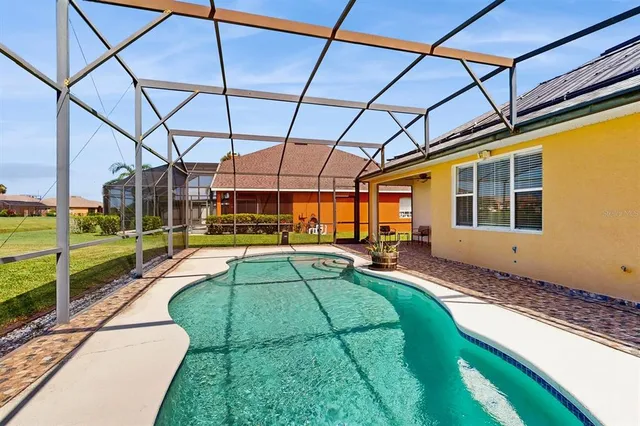 a view of yard with outdoor seating and hardwood
