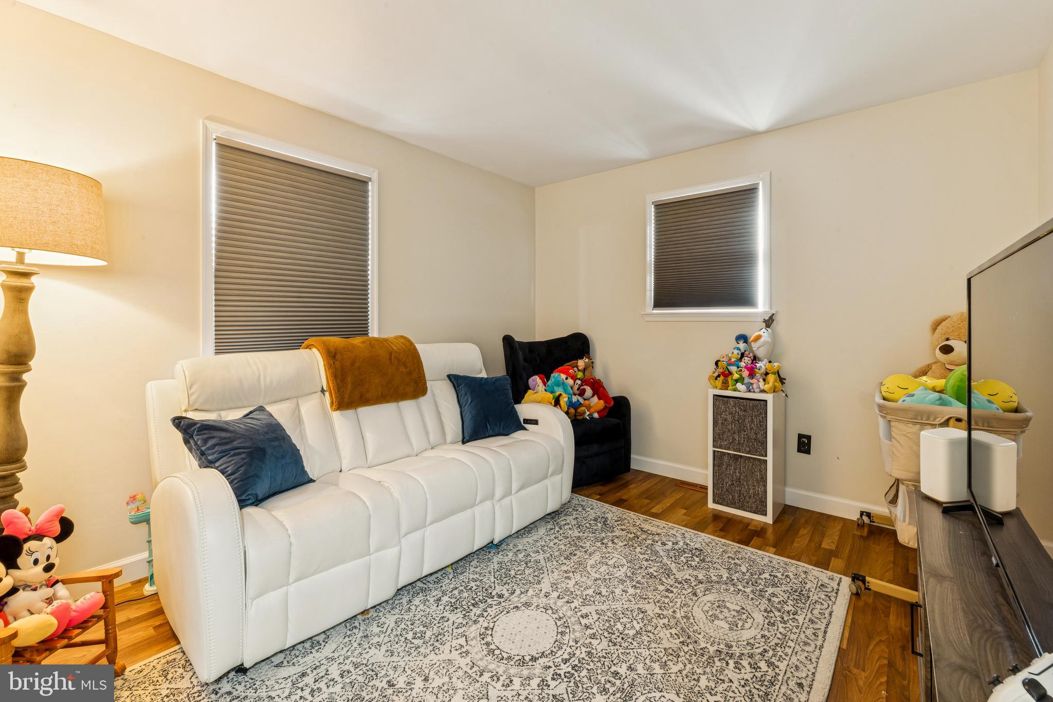 224 Hurffville Grenloch Road Sewell, NJ 08080 - Photo 12 of 23 a living room with furniture and a rug
