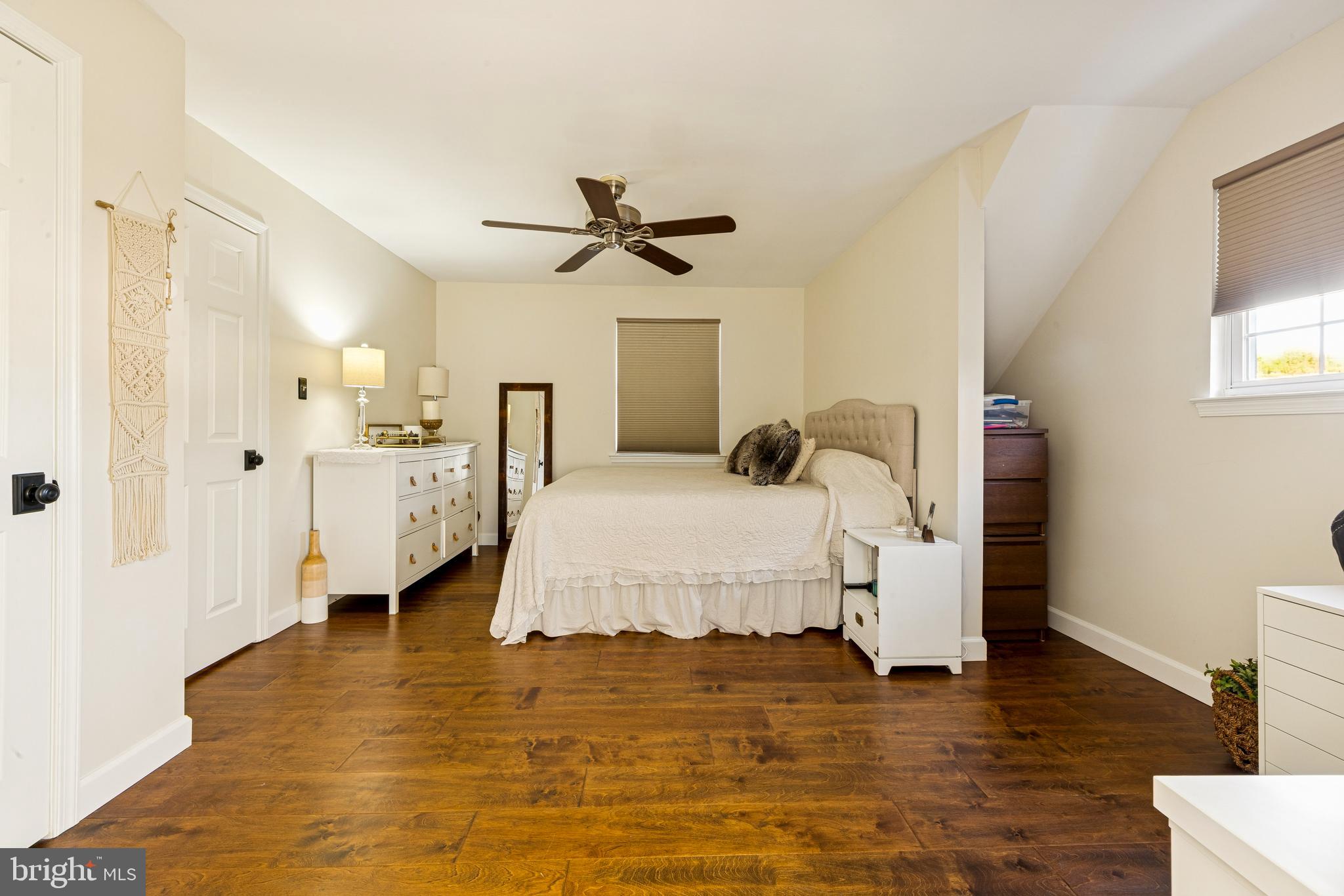 224 Hurffville Grenloch Road Sewell, NJ 08080 - Photo 14 of 23 a bedroom with a bed and a chandelier
