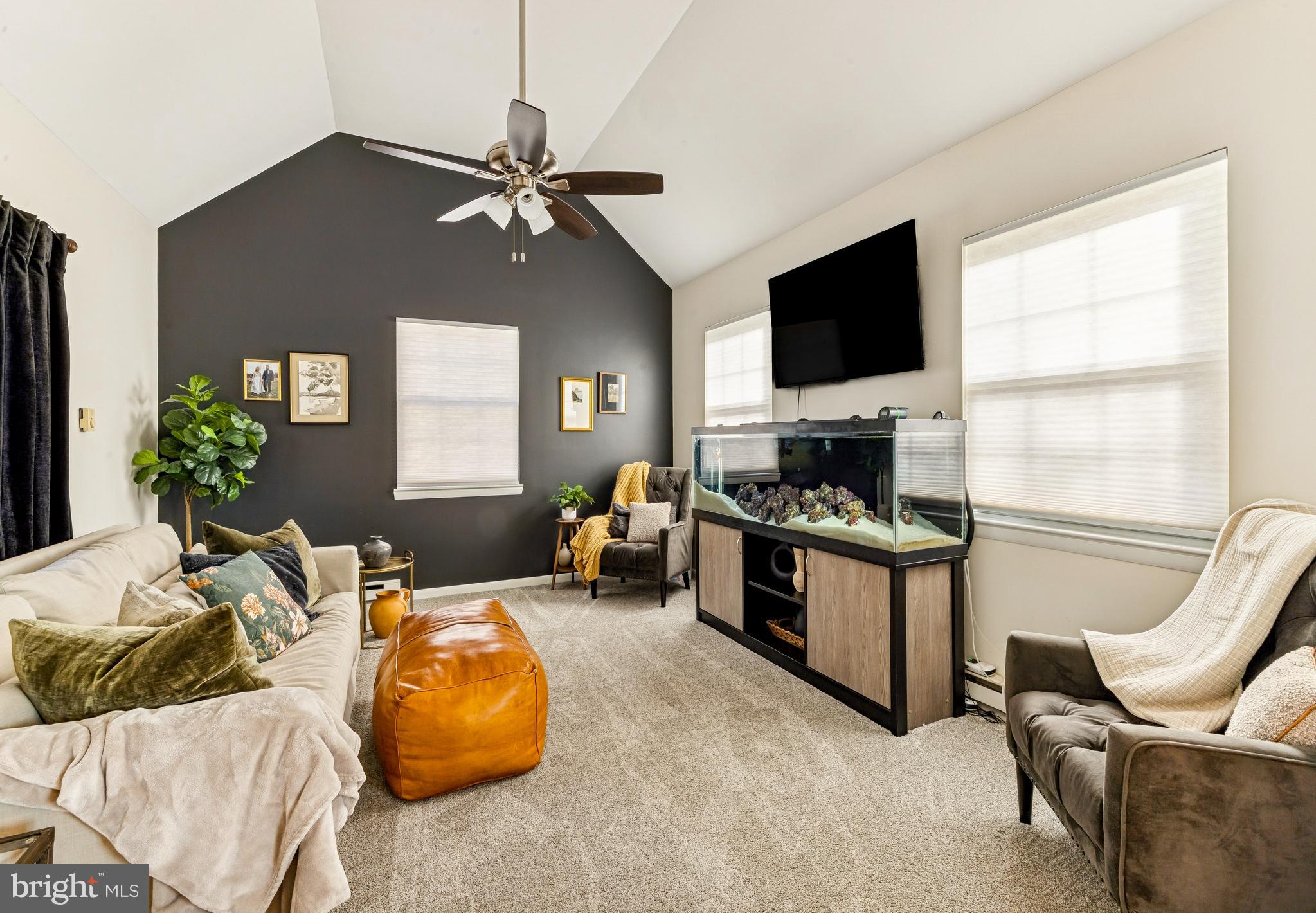 224 Hurffville Grenloch Road Sewell, NJ 08080 - Photo 3 of 23 a bedroom with furniture and a flat screen tv