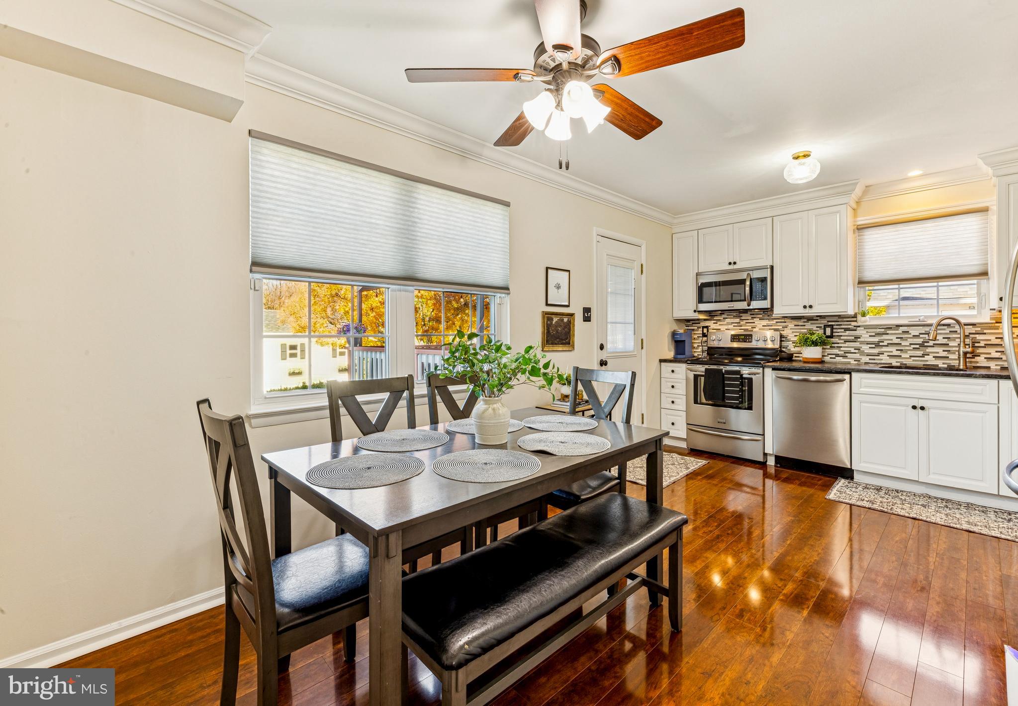 224 Hurffville Grenloch Road Sewell, NJ 08080 - Photo 7 of 23 a view of a dining room with furniture window and wooden floor