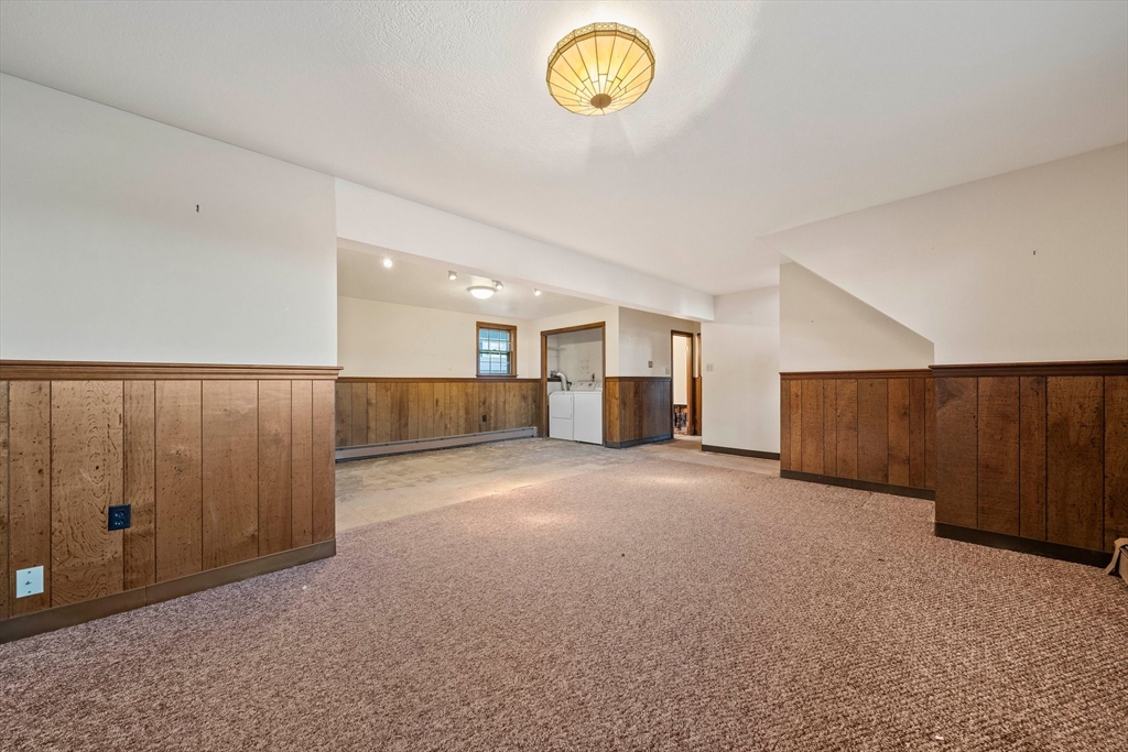 59 Windsor Road Weymouth, MA 02190 - Photo 20 of 39 a view of a room with furniture and garage