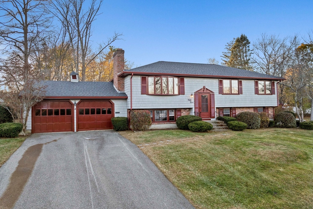 59 Windsor Road Weymouth, MA 02190 - Photo 2 of 39 a front view of a house with garden