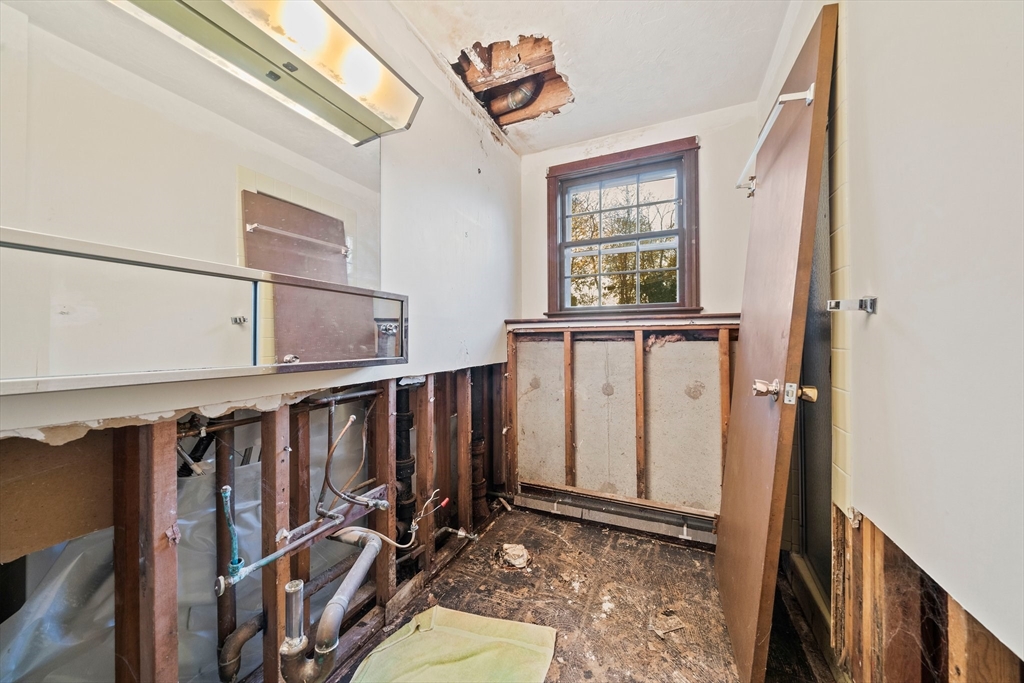 59 Windsor Road Weymouth, MA 02190 - Photo 23 of 39 a view of an entryway with wooden floor