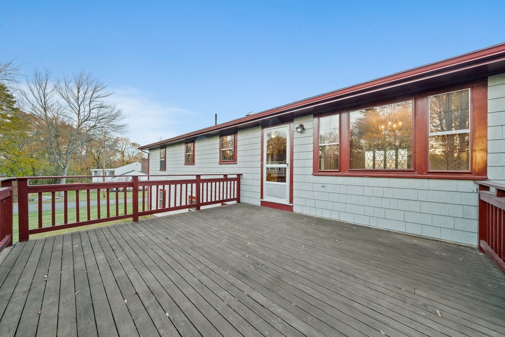 59 Windsor Road Weymouth, MA 02190 - Photo 27 of 39 a view of porch with wooden floor and fence