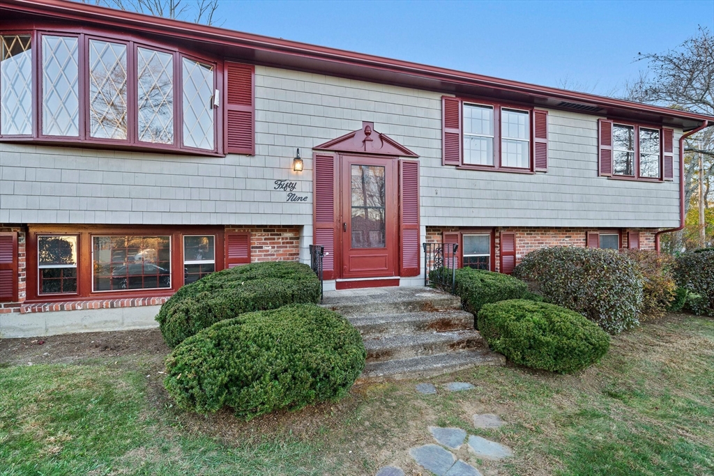 59 Windsor Road Weymouth, MA 02190 - Photo 3 of 39 a front view of a house with garden