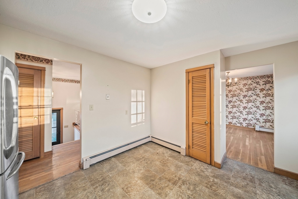 59 Windsor Road Weymouth, MA 02190 - Photo 6 of 39 an empty room with windows