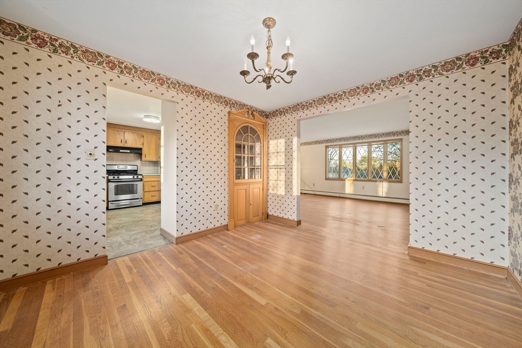 59 Windsor Road Weymouth, MA 02190 - Photo 8 of 39 a view of an empty room with a window