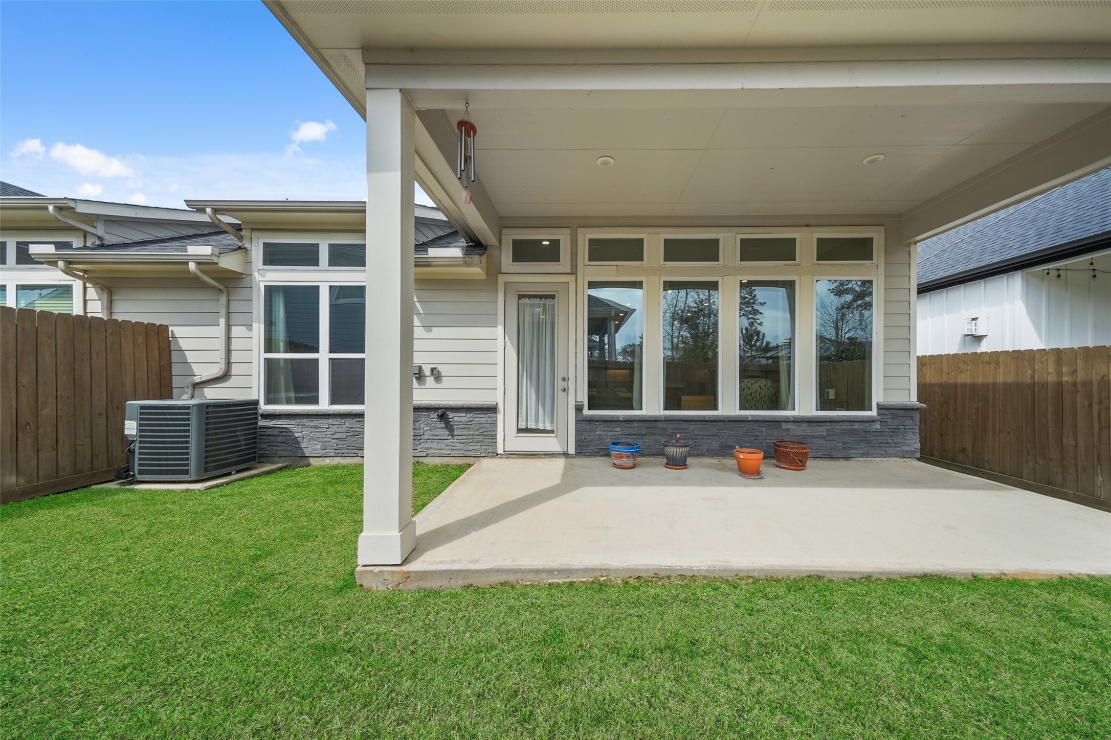 21335 Sierra Point Lane Porter, TX 77365 - Photo 21 of 33 a view of a house with backyard and porch