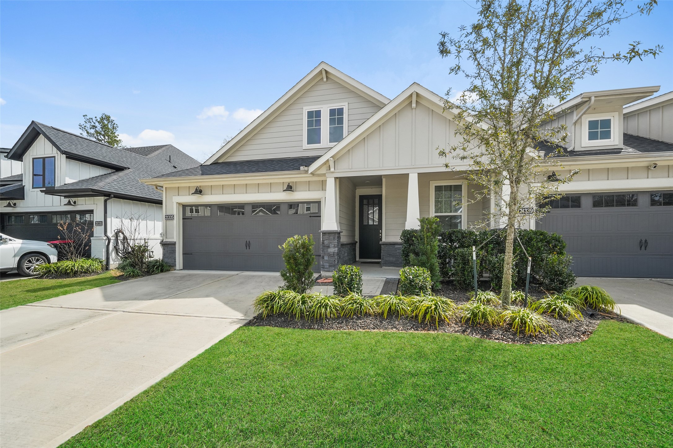 21335 Sierra Point Lane Porter, TX 77365 - Photo 23 of 33 a front view of a house with a yard and porch
