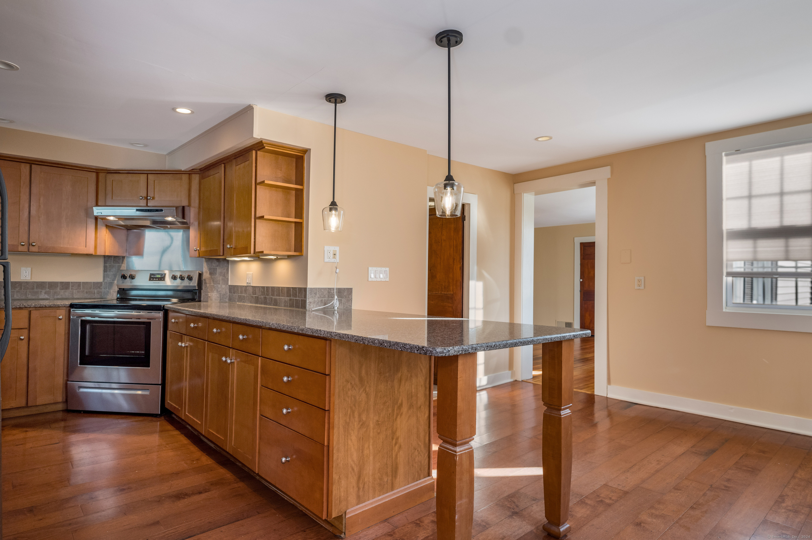 97 Commerce Street Clinton, CT 06413 - Photo 3 of 20 Refinished hardwood floors throughout.