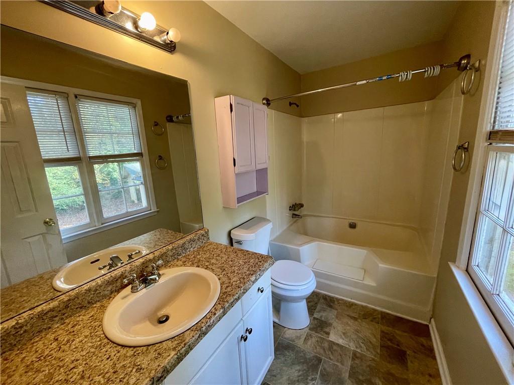 256 Robbie Lane Marietta, GA 30060 - Photo 11 of 17 a bathroom with a sink toilet tub and shower