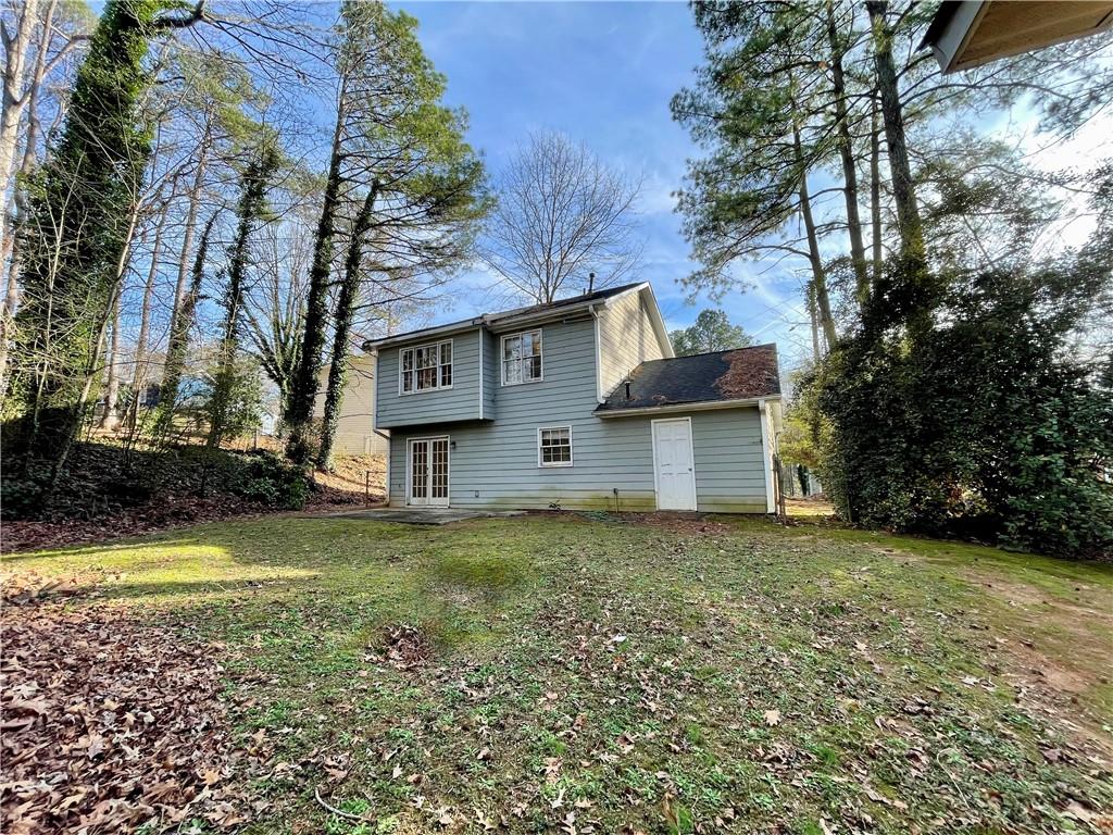 256 Robbie Lane Marietta, GA 30060 - Photo 15 of 17 a view of a house with a yard