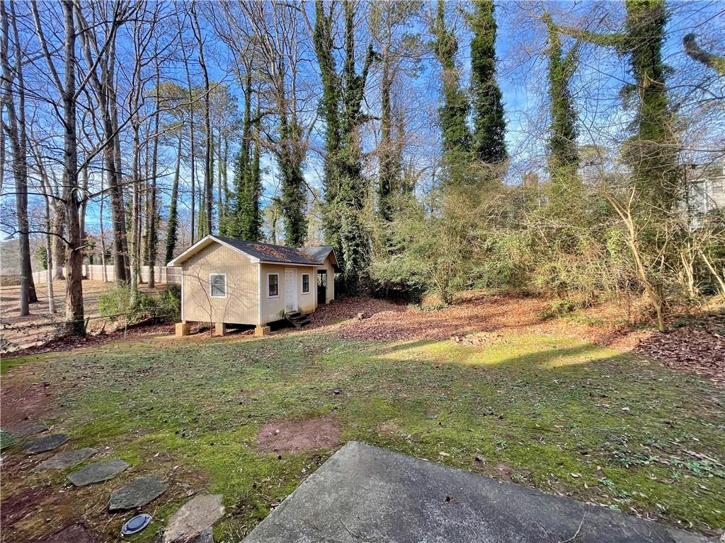 256 Robbie Lane Marietta, GA 30060 - Photo 16 of 17 a view of a house with a yard