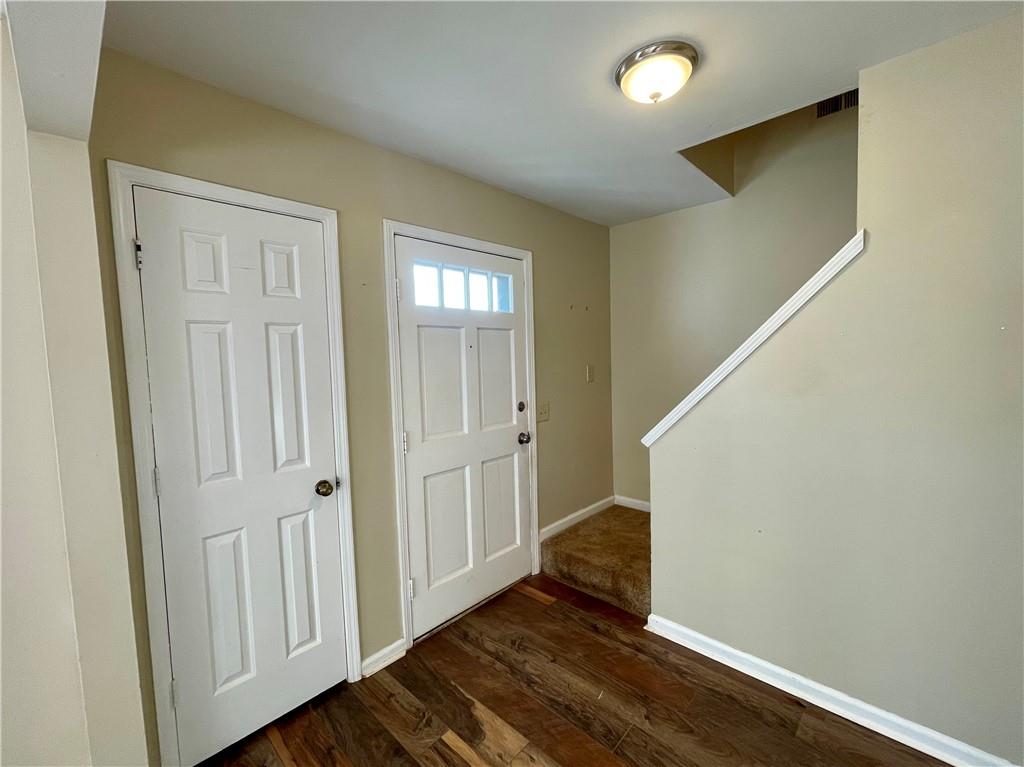 256 Robbie Lane Marietta, GA 30060 - Photo 2 of 17 wooden floor in an empty room