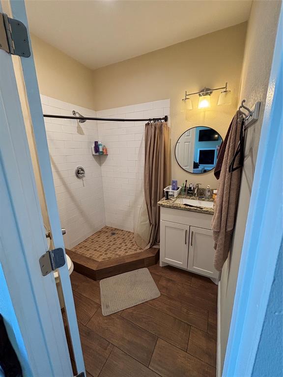 343 North Morris Street Gainesville, TX 76240 - Photo 10 of 18 a kitchen with a refrigerator and a stove