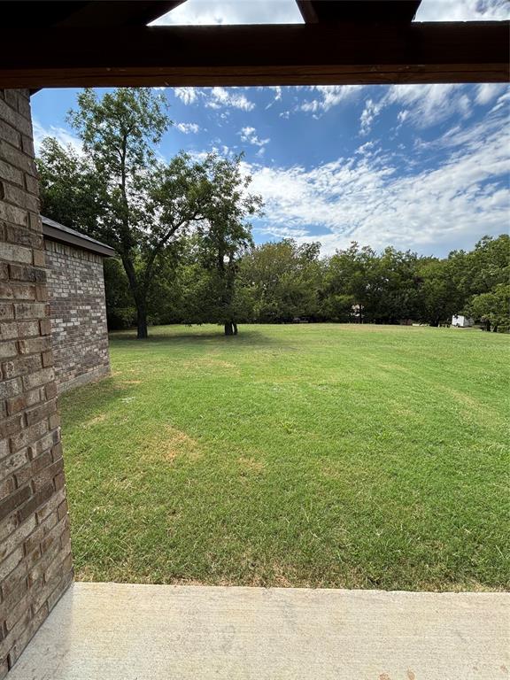 343 North Morris Street Gainesville, TX 76240 - Photo 16 of 18 a view of a field with an outdoor space
