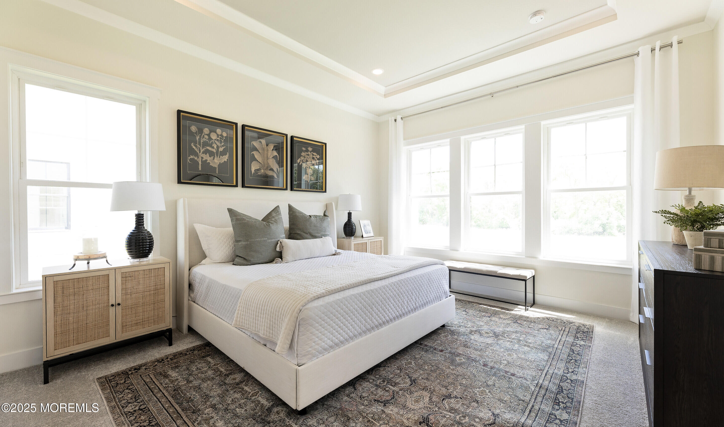 176 Highway 33, Unit IBIZA II LOFT Manalapan, NJ 07726 - Photo 16 of 39 a bedroom with a large bed and a window with lamp