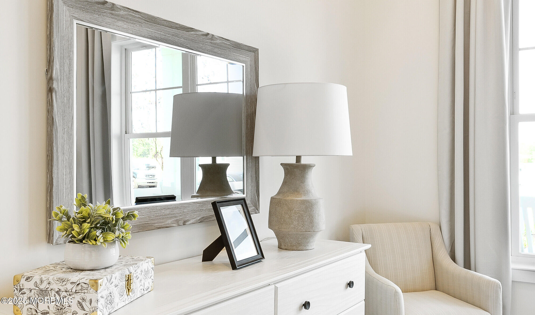 176 Highway 33, Unit IBIZA II LOFT Manalapan, NJ 07726 - Photo 22 of 39 a living room with furniture and a potted plant