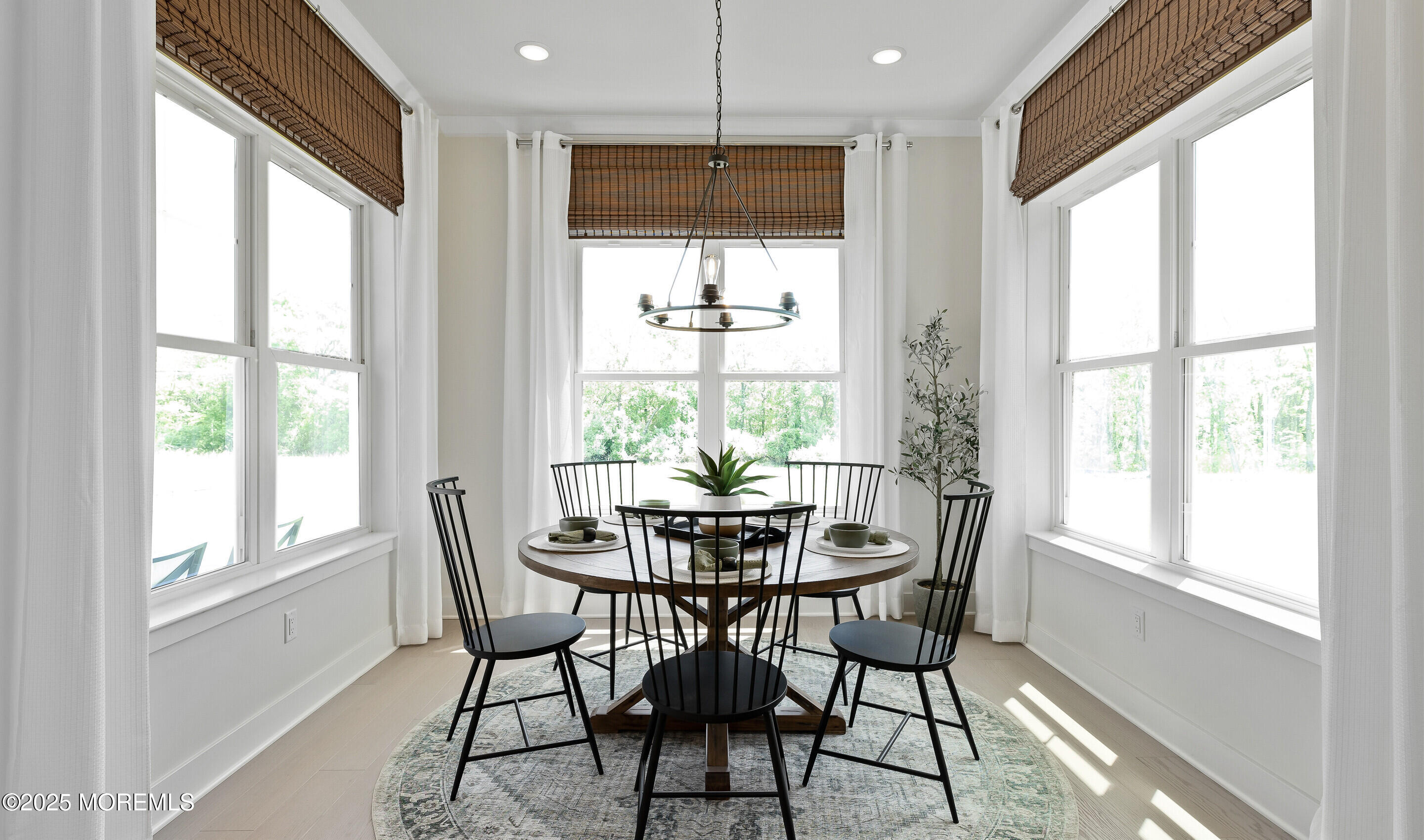 176 Highway 33, Unit IBIZA II LOFT Manalapan, NJ 07726 - Photo 25 of 39 a dining room with furniture window and outside view