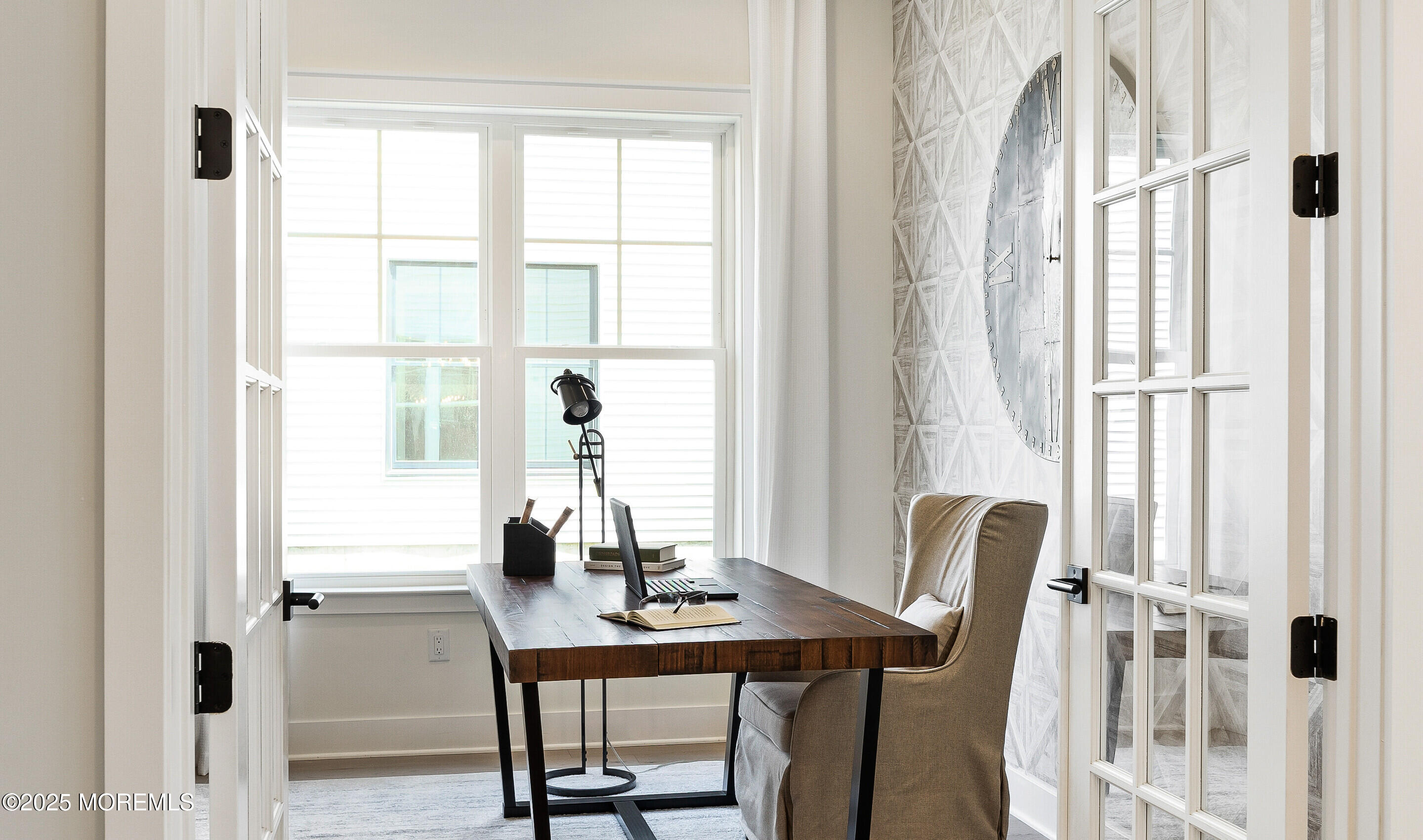 176 Highway 33, Unit IBIZA II LOFT Manalapan, NJ 07726 - Photo 3 of 39 a view of a workspace with furniture and a window