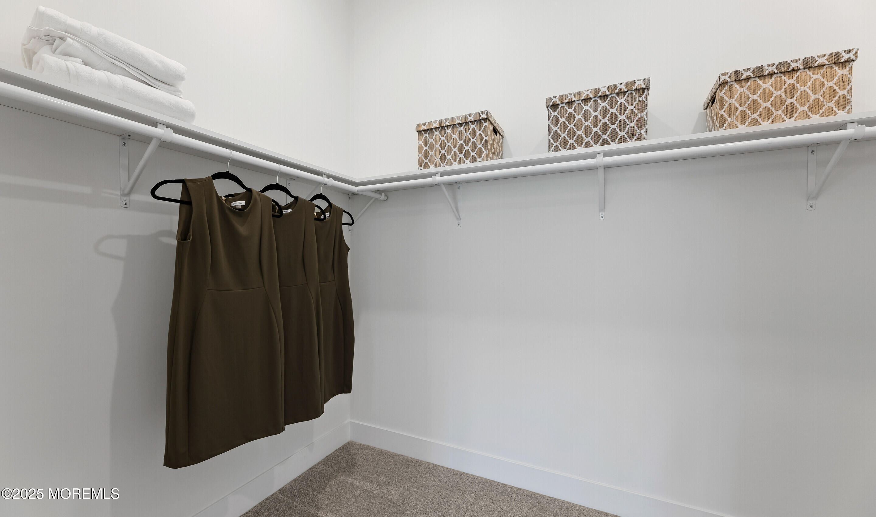 176 Highway 33, Unit IBIZA II LOFT Manalapan, NJ 07726 - Photo 37 of 39 a close view of closet