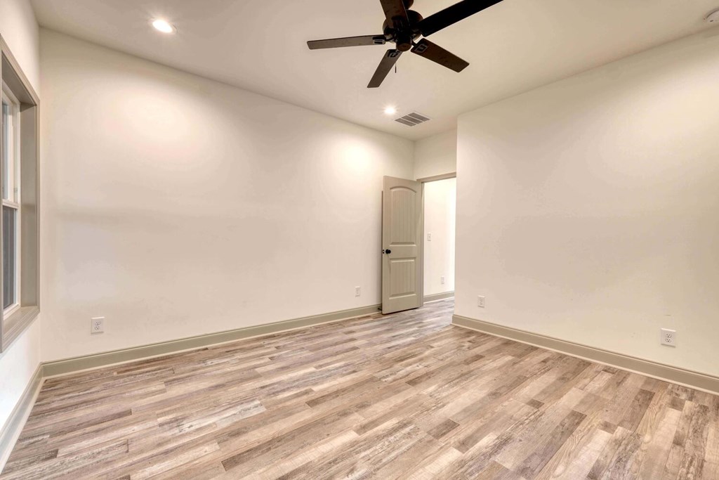 63 Nottaway Road Young Harris, GA 30582 - Photo 21 of 35 an empty room with fan and windows