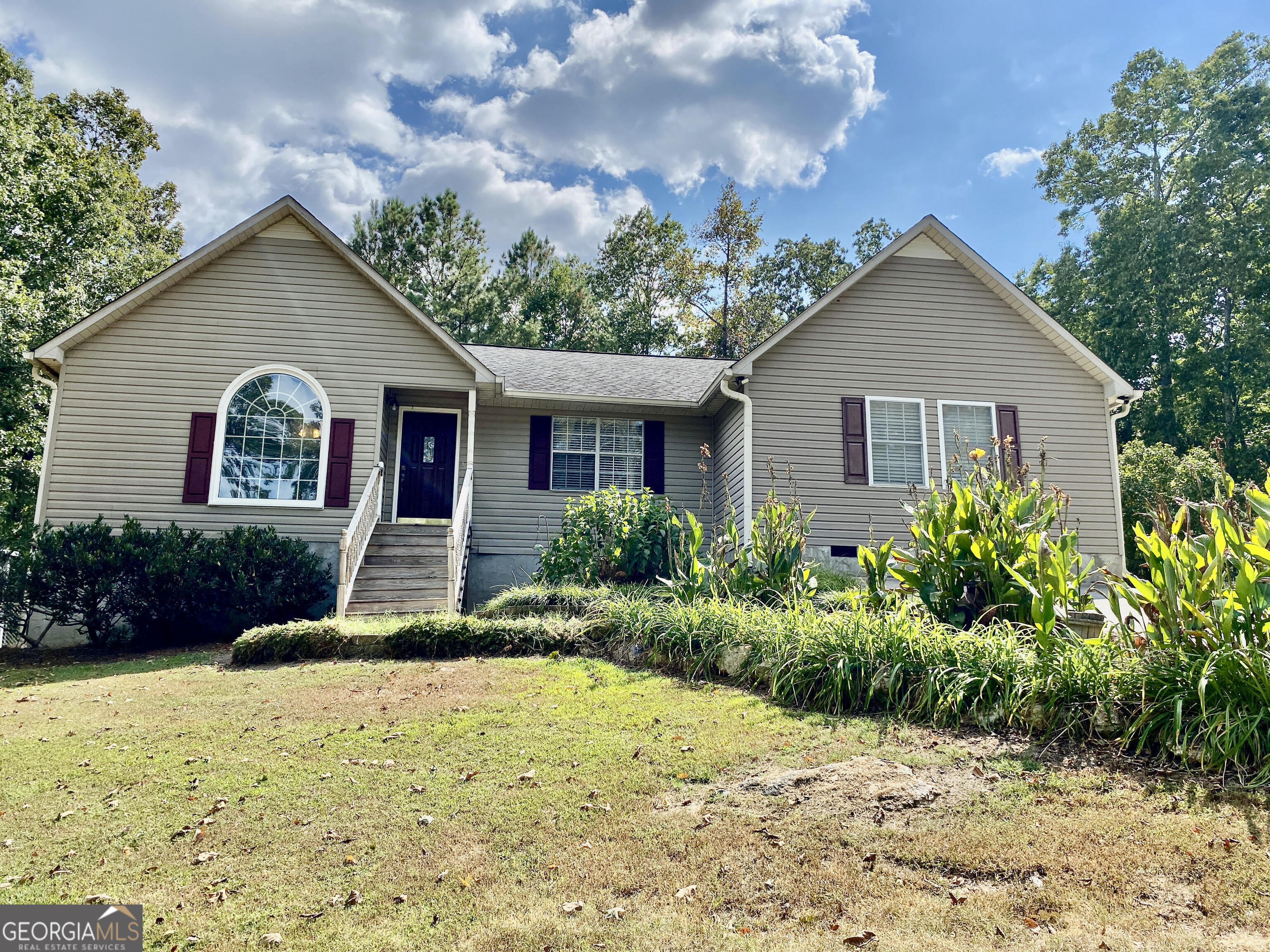 1832 Wayside Road Kingston, GA 30145 - Photo 1 of 1 a front view of house with yard and trees around