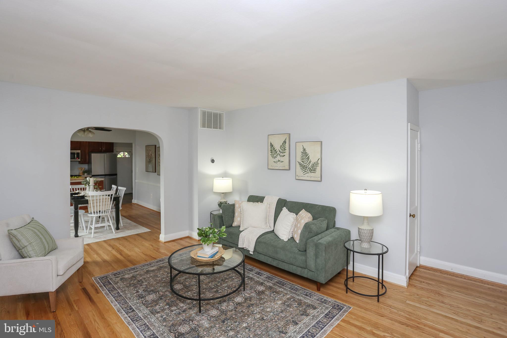 409 South Wickham Road Baltimore, MD 21229 - Photo 5 of 48 Living room with hardwood floors & fresh paint
