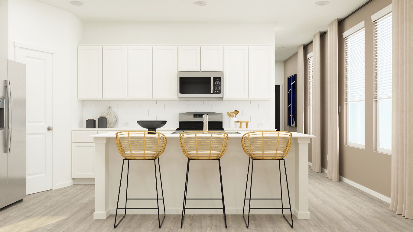 23405 Firelight Drive Elgin, TX 78621 - Photo 18 of 33 a view of a dining room with furniture and wooden floor