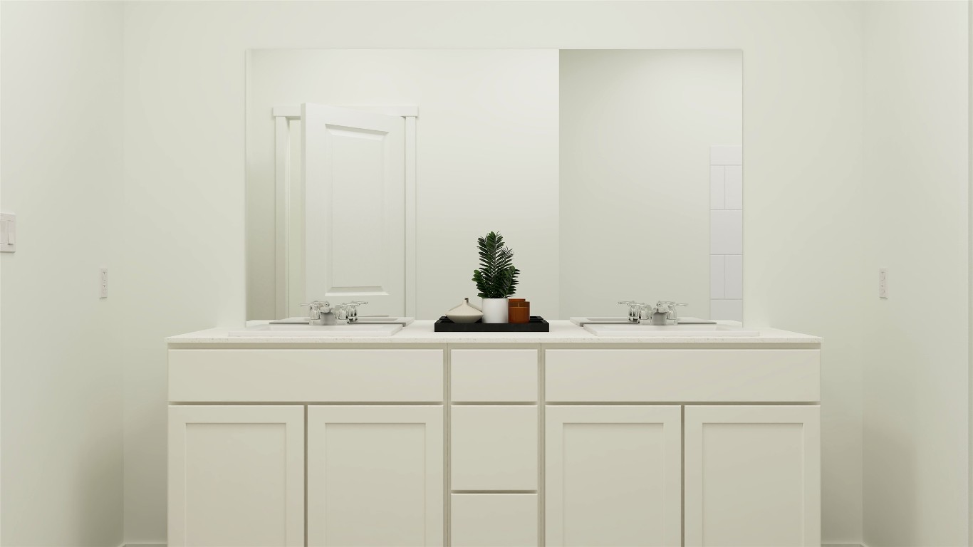 23405 Firelight Drive Elgin, TX 78621 - Photo 25 of 33 a bathroom with a sink and a mirror