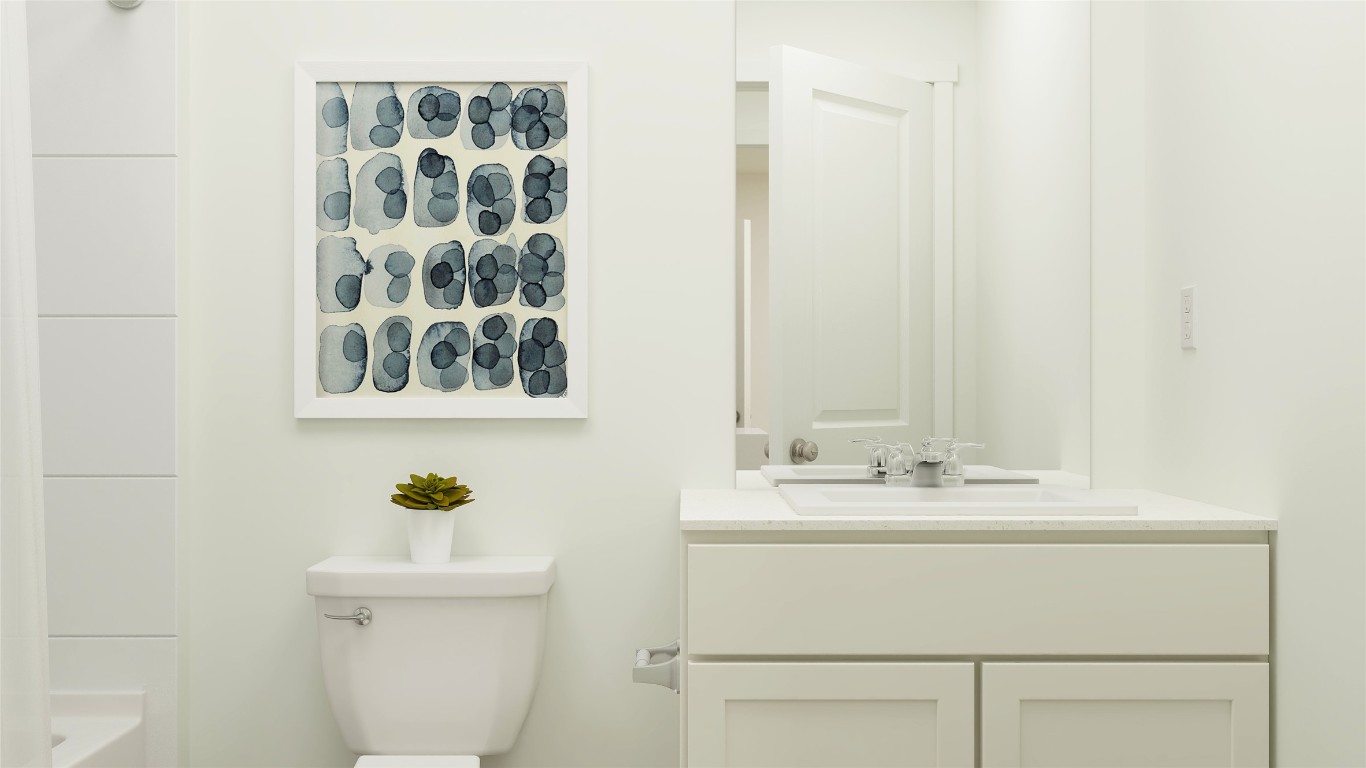 23405 Firelight Drive Elgin, TX 78621 - Photo 27 of 33 a bathroom with a sink mirror and toilet