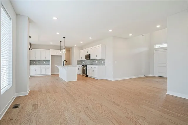 $479,950 | 409 Woodview Drive, Raymore, MO 64083