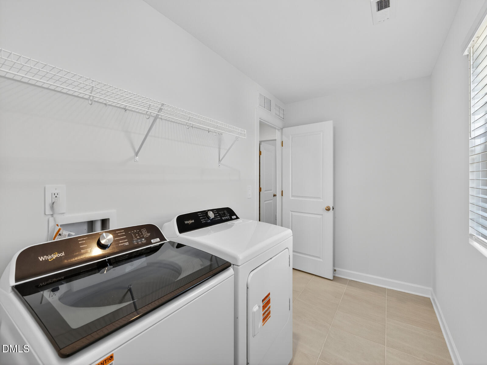 62 Thistle Patch Place Angier, NC 27501 - Photo 16 of 22 a utility room with dryer and washer
