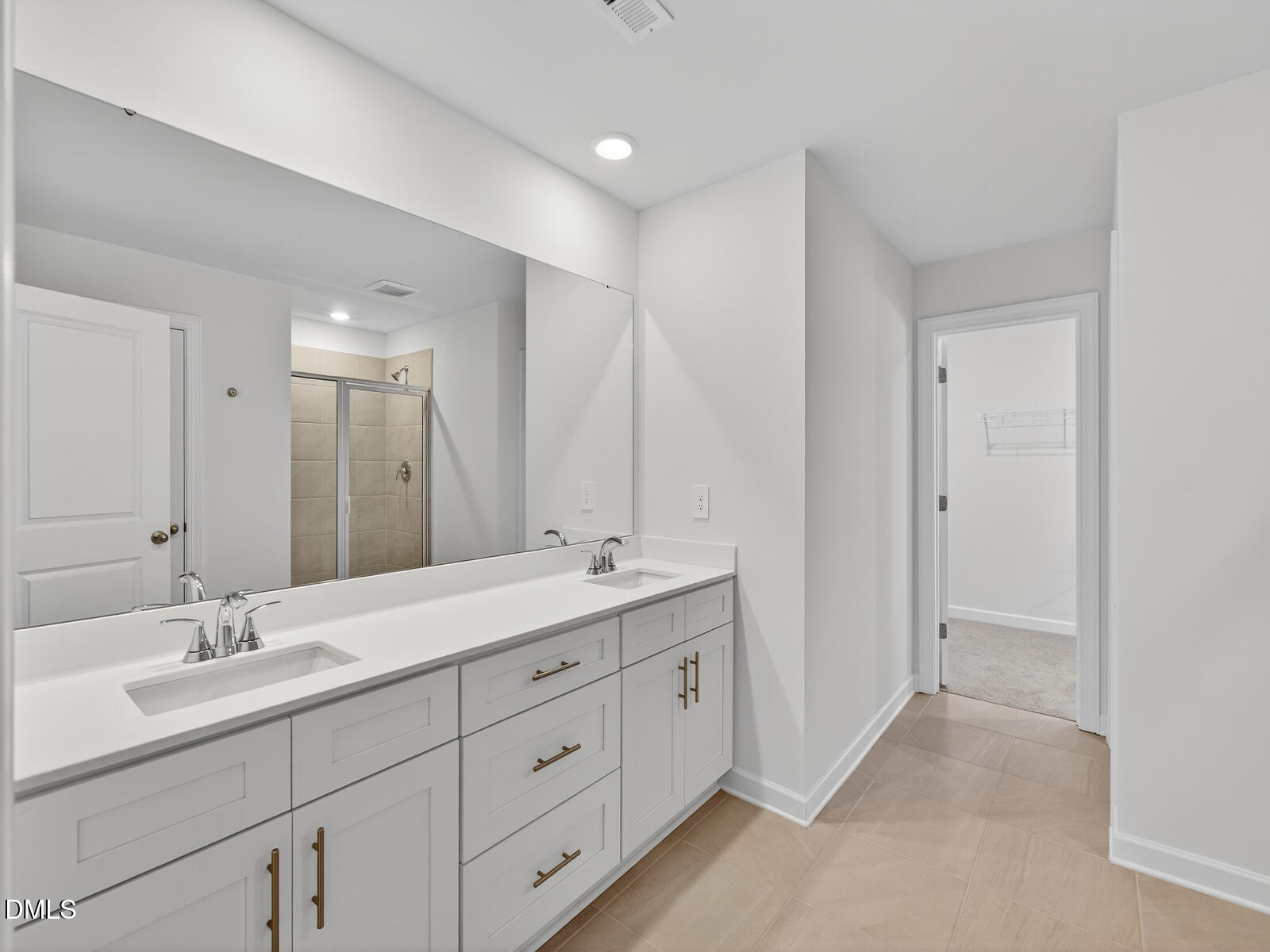 62 Thistle Patch Place Angier, NC 27501 - Photo 18 of 22 a bathroom with double sink and mirror