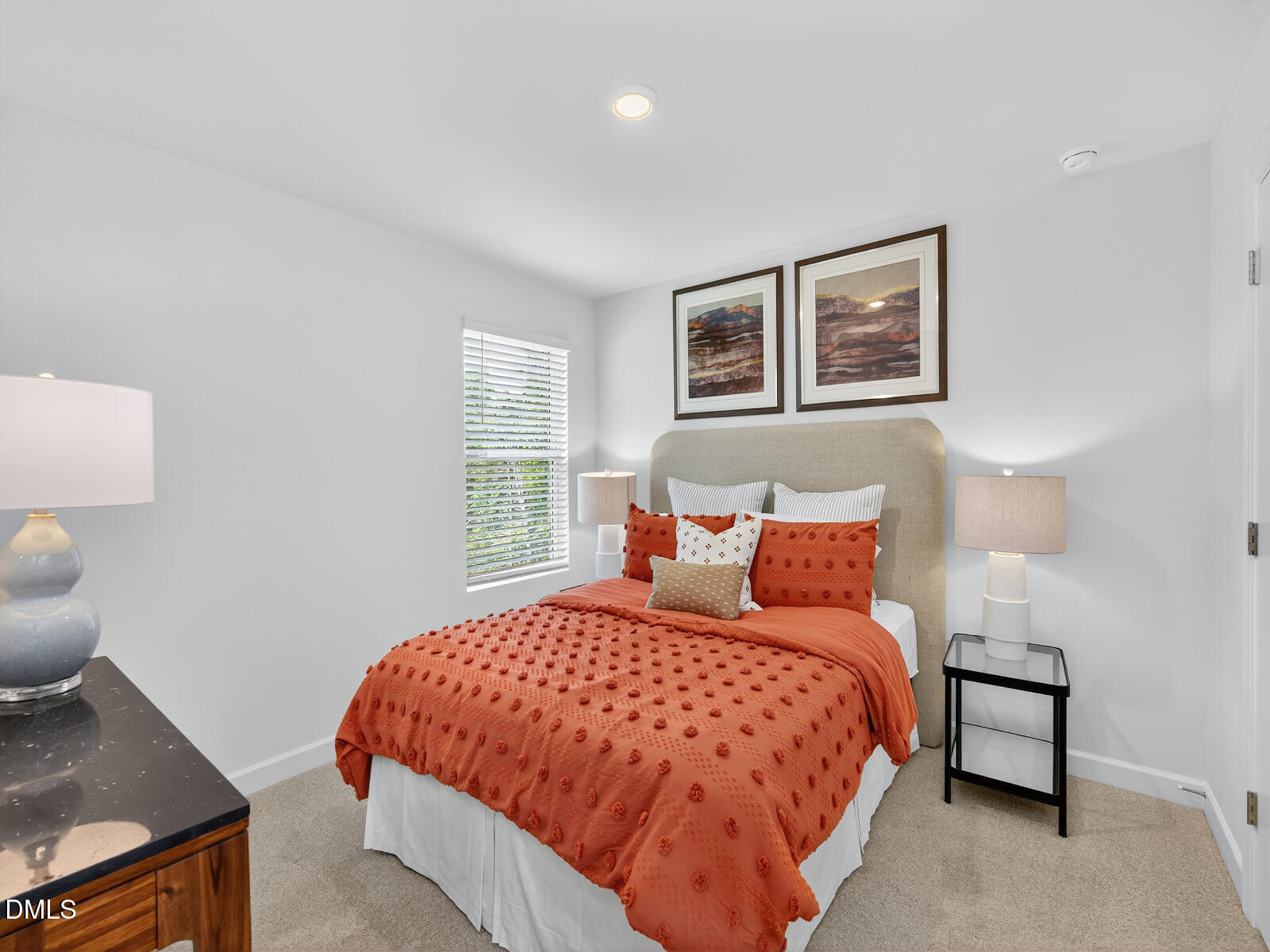 62 Thistle Patch Place Angier, NC 27501 - Photo 20 of 22 a bedroom with a bed and painting on the wall