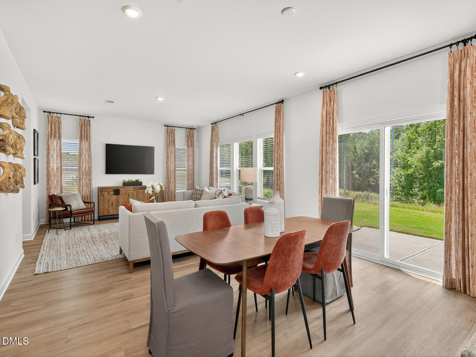 62 Thistle Patch Place Angier, NC 27501 - Photo 7 of 22 a view of a dining room with furniture window and wooden floor