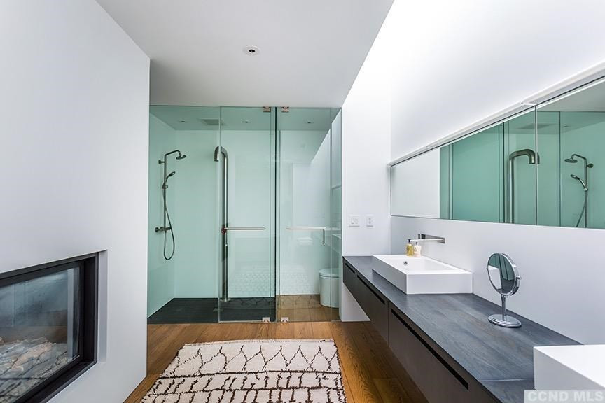 708 New Forge Rd II Taghkanic, NY 12502 - Photo 16 of 29 a bathroom with a granite countertop sink a mirror and shower