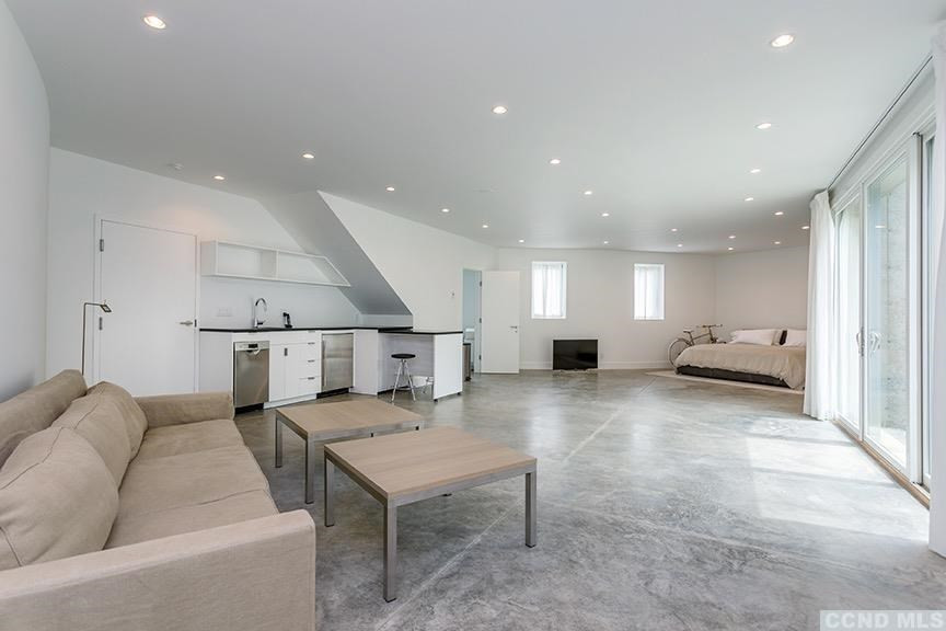 708 New Forge Rd II Taghkanic, NY 12502 - Photo 24 of 29 a living room with furniture and a table